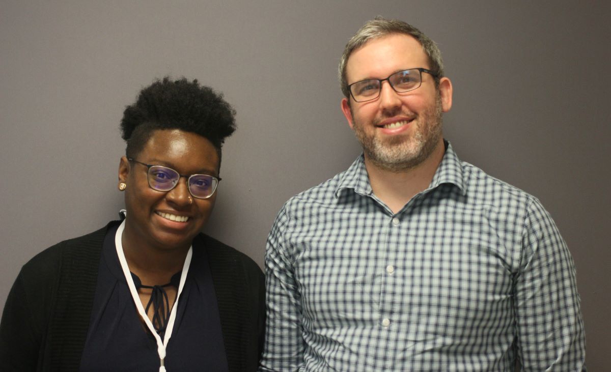 Ebonie and Carl Megibow standing next to each other and smiling