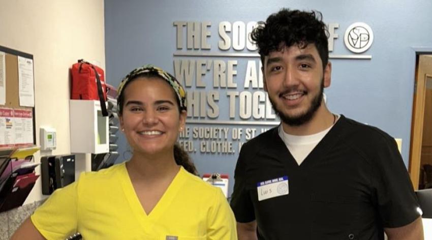Jasmine Lopez and Luis Dominguez Monge in the lobby of St. Vincent de Paul's Virginia G. Piper Medical Clinic