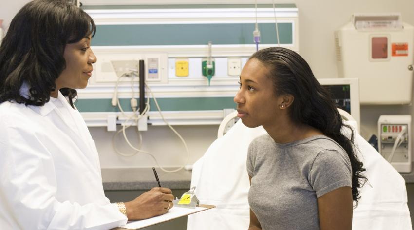 Doctor talking to patient
